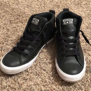 Black, high top converse.